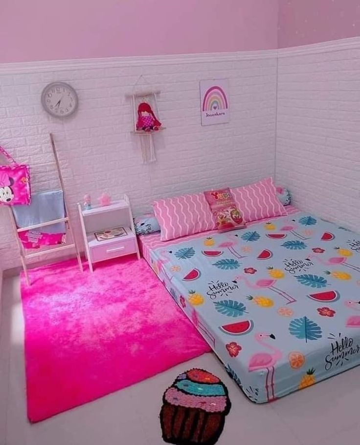 a bedroom with pink walls and carpeted flooring in the room is decorated like a child's bed