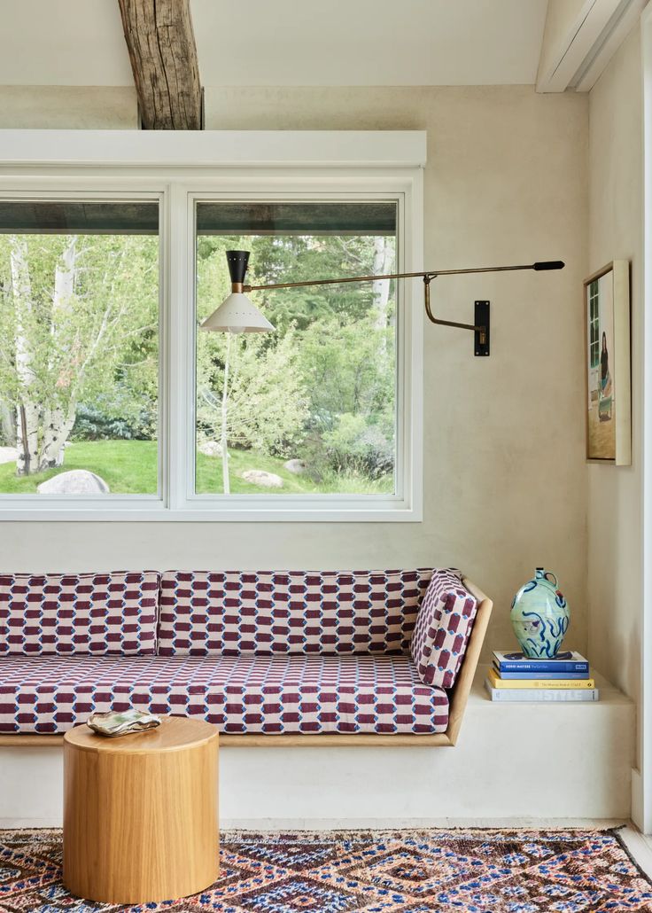 a living room with a couch and window