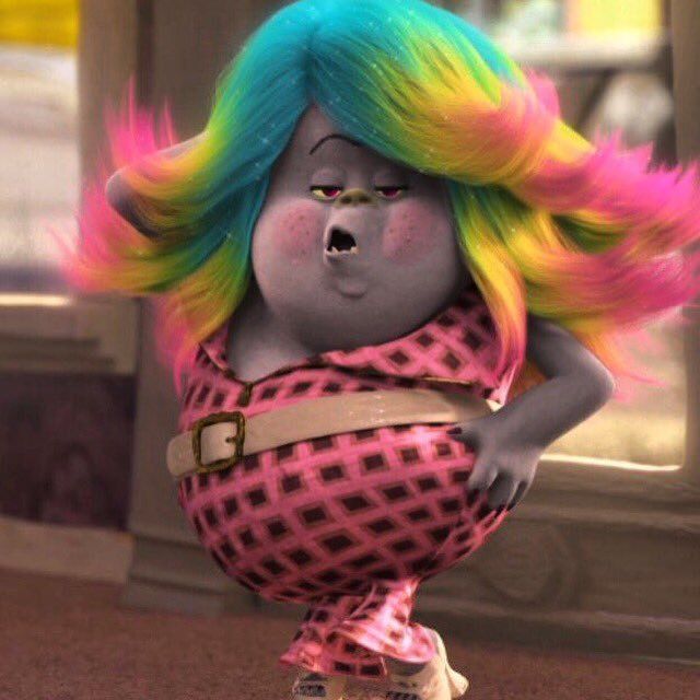 an animated character with multicolored hair and makeup