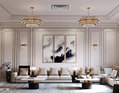 a living room with white couches and chandeliers on the wall above them