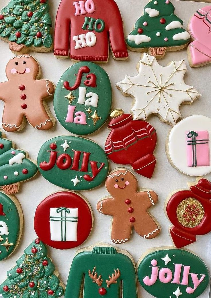 christmas cookies decorated with different designs and colors