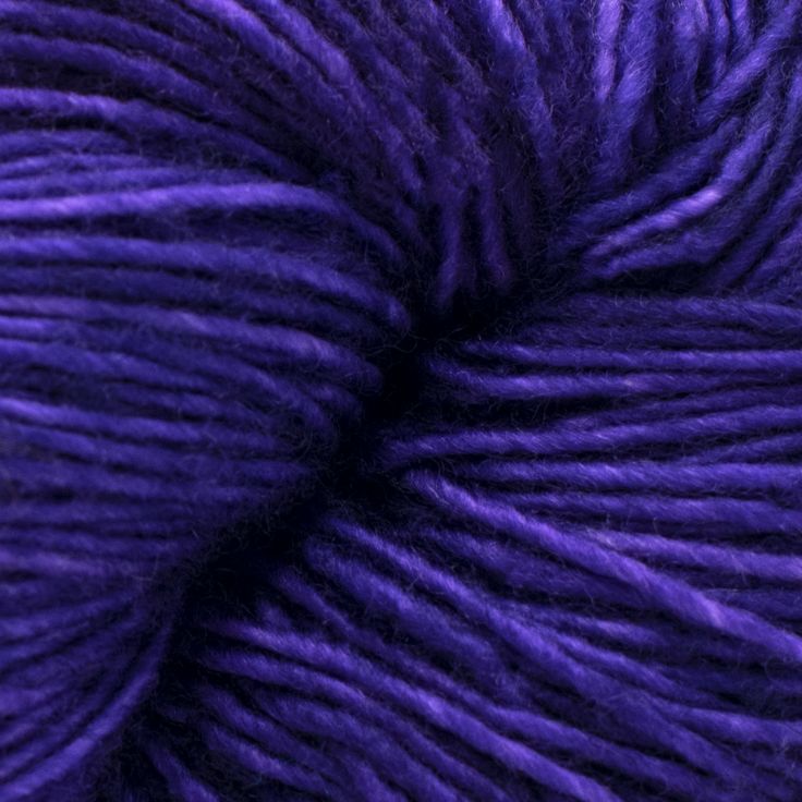 a purple ball of yarn is shown