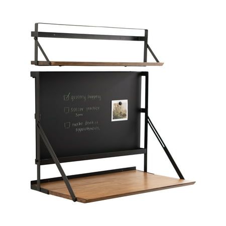 a blackboard with some writing on it next to a wooden shelf filled with pictures