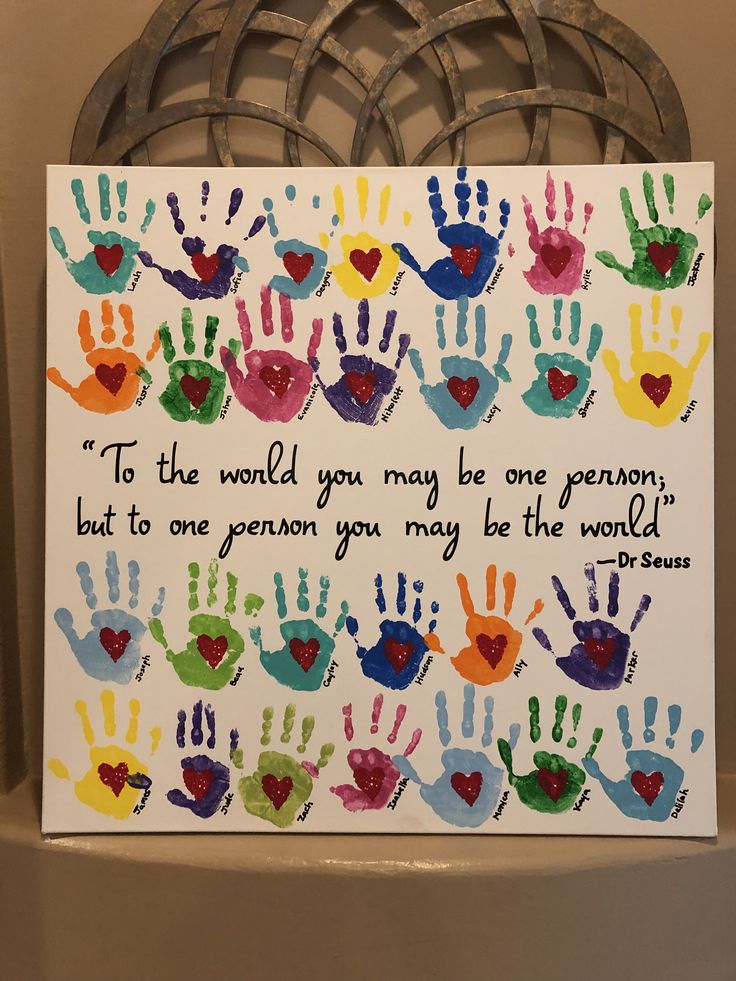 a card with handprints on it that says to the world you may be one person, but to one person you may be the world