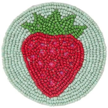 a red and green beaded strawberry on a white circle with pink dots in the center