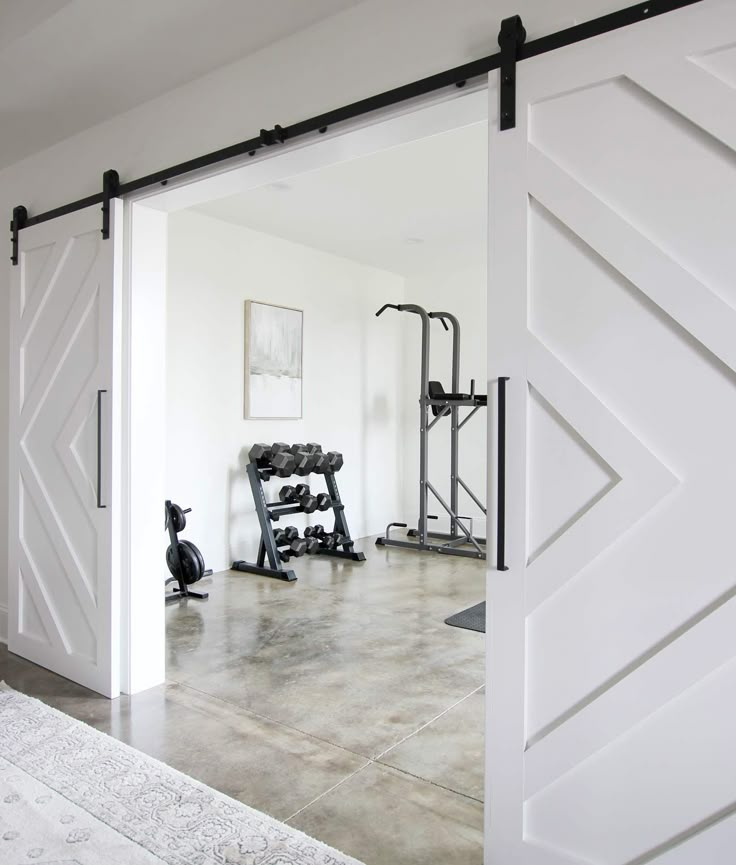 an open door leading to a gym room