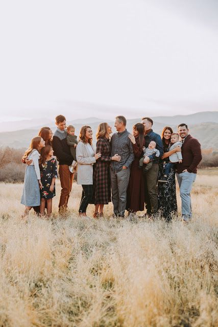 a large group of people standing in a field