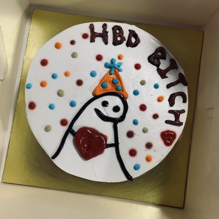 a birthday cake with the words happy birthday written on it and an image of a person holding a heart