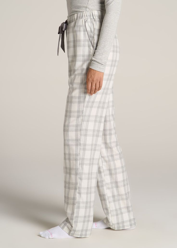 About Our Women’s Tall Flannel Pajamas You’ll never want to get out of bed when you’re wearing these women’s tall pajama pants. For years, tall women have had to settle for PJs that are way too short and fit in all the wrong places, but not anymore. You loved our classic flannel PJs and now we’re bringing you a pair with a regular fit and an open-bottom leg with all the length you need. These pajama pants have been designed exclusively for women between 5’9” and 6’6��” with two different length op Cute Comfy Pjs, Plad Pajamas, Cute Pjs Pants, Women’s Pjs, College Pajamas, Flannel Pants Outfit, Pajama Pants Outfit For School, Pjama Pants, Cute Pj Pants