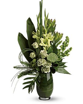 a green vase filled with white flowers and greenery on a white background, in the shape of a flower arrangement