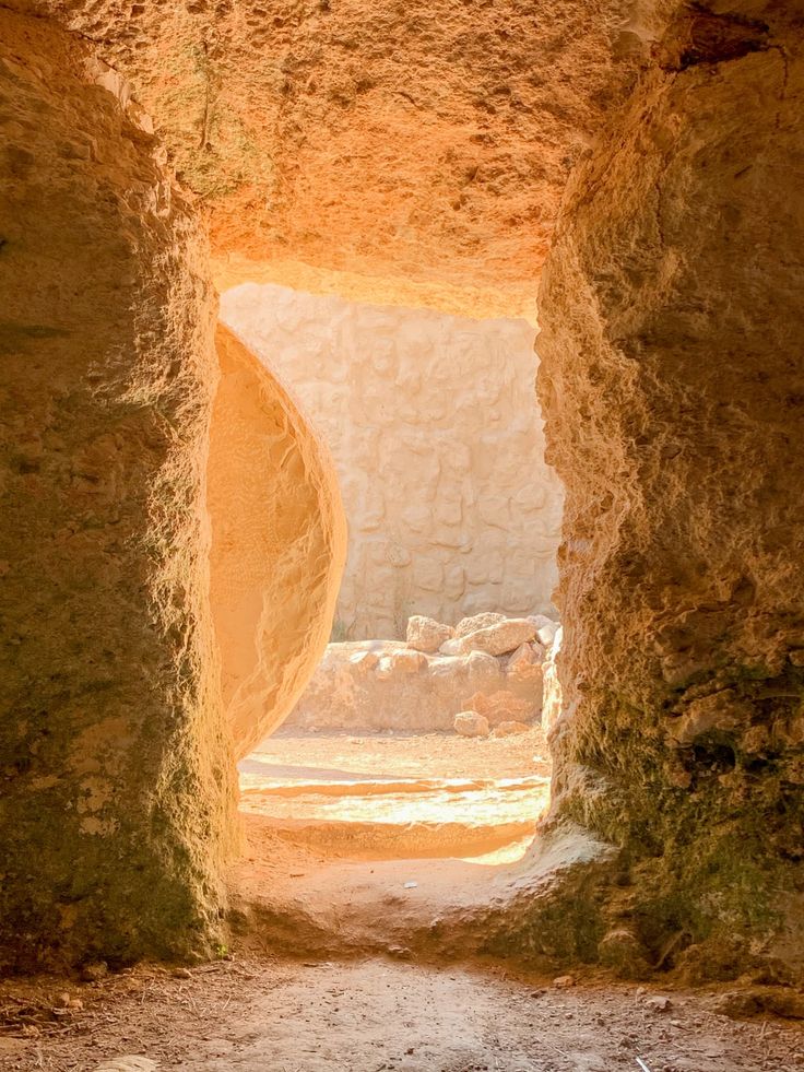 an open stone tunnel in the desert