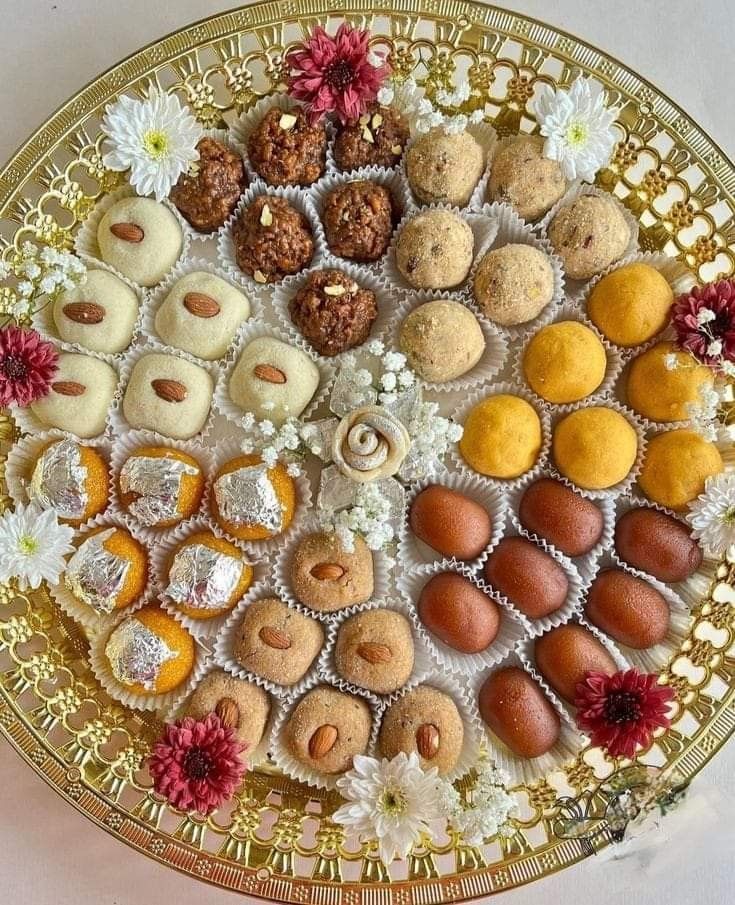 a platter filled with lots of different types of pastries