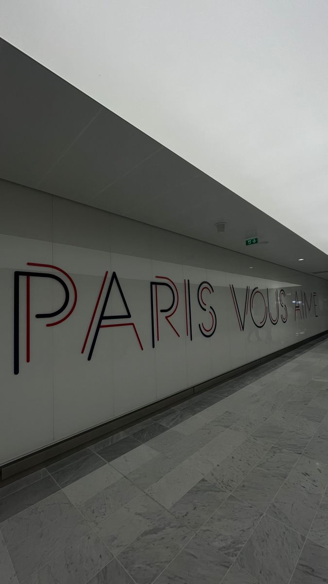 the entrance to paris's museum of modern art is painted in red and black