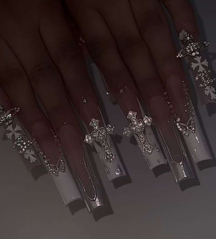 Acrylic Nail Designs With Crosses, Nails Acrylic With Cross Charm, Diamond Cross Nails, Cross Charms Nails, Birthday Nails Charms, Big Gem Nails, Angel Nails Designs Simple, Gem Ideas For Nails, Nails With Crosses On Them