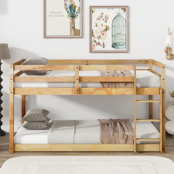 a wooden bunk bed sitting next to a white rug