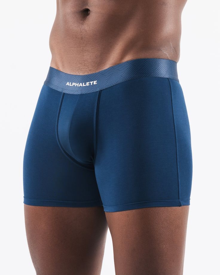 HIGHLIGHTS. Branded elastic waistband Ergonomic pouch shaped for optimal support Light-weight breathable fabric. Pack of 2 FIT SUGGESTION. This item runs small, we recommend sizing up. Model is 6’0”/183cm, wearing a size M with a 30.5”/77.5cm waist. MATERIALS AND WASHING DIRECTIONS. 66% Modal, 28% Nylon, 6% Spandex. We recommend washing inside-out on a cold setting. Hang to dry DESCRIPTION An elevated version of Men's underwear. Each piece is crafted with premium modal blend, a fabric known for its breathability and moisture-wicking properties. As an added advantage, these garments are hypoallergenic and sustainable. | Alphalete Men's Core Boxer Brief 2pk | Midnight Blue | 2XL | Nylon/Modal/Spandex | Sustainable Activewear | Moisture Wicking Men In Briefs, Brief For Men, Sustainable Activewear, Ideal Male Body, Mens Innerwear, Male Boxers, Boxer For Men, Jockstrap Men, Mens Undershirts