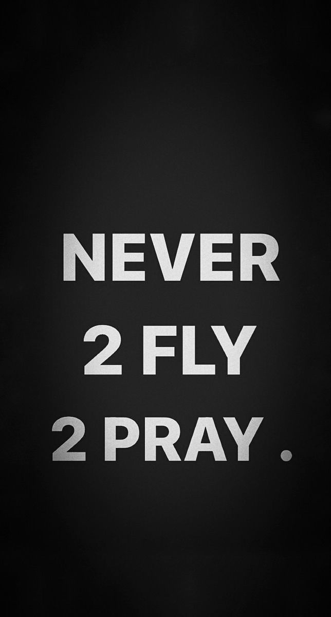 a black and white photo with the words never 2 fly 2 pray written in white