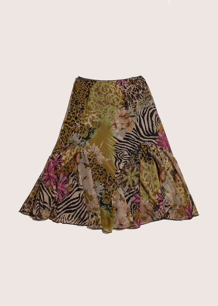 A fun funky printed skirt that gives all those Y2K vibes! Mixed animal and floral print. Rouge Petite brand and labeled Small petite size. Stretchy comfy fabric with lots of movement and a-line shape to it.  Measurments (flat lay): Labeled petite small  100% Polyester  Waist: Begins at 12 inches and goes up to 18 inches (Has lots of stretch) Length: 27 inches Y2k Style Multicolor Summer Skirt, Y2k Fitted Ruffled Skirt, Multicolor Y2k Style Summer Skirt, Y2k Ruffled Skirt For Spring, Y2k Multicolor Mini Skirt For Spring, Funky Skirts, Princess Aesthetic Outfits, Funky Fits, Colourful Clothes