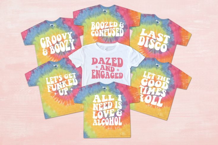 six tie dye t - shirts with the words dazed and engaged printed on them in different colors