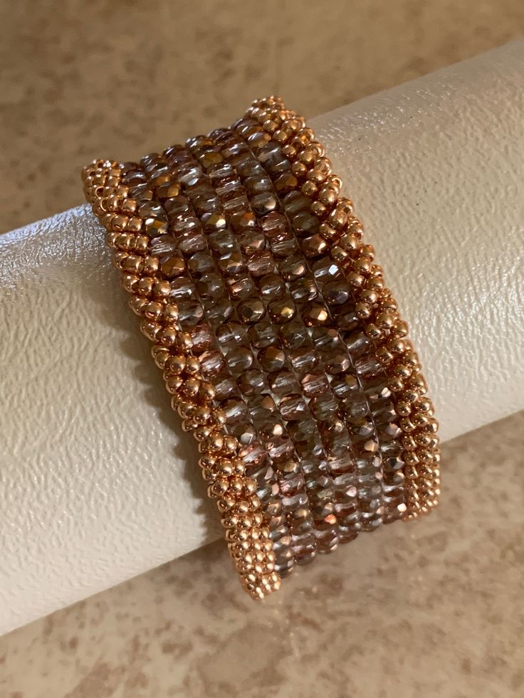 This is a one of kind, Czech fine polish cuff handcrafted with a copper slide clasp. Unique Gold Beaded Cuff Bracelet, Elegant Copper Cuff Bracelet, Artisan Gold Copper Bracelets, Handmade Bronze Cuff Bracelet For Formal Occasions, Elegant Brown Cuff Bracelet As Gift, Elegant Brown Cuff Bracelet Gift, Rose Gold Copper Bangle Cuff Bracelet, Rose Gold Copper Cuff Bangle, Elegant Rose Gold Copper Bangle