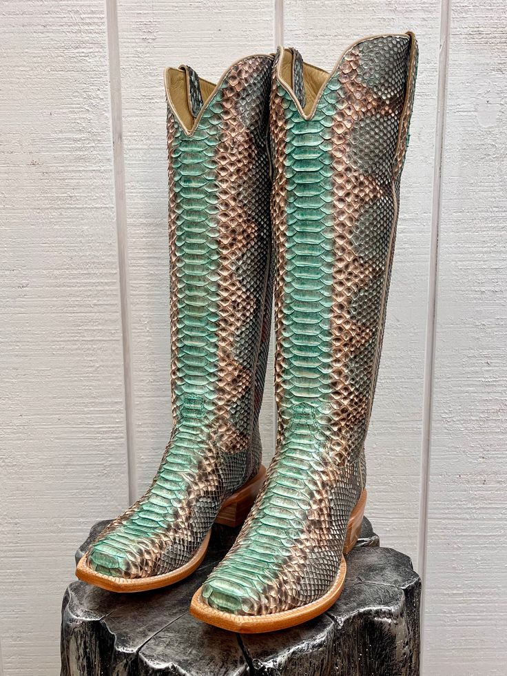 R. Watson presents these 17″ drop-dead gorgeous Teal & Copper Python boots! They feature the R. Watson comfort system, all leather stacked heel, counters, solid steel shank, and 10 iron outsole. Cowboy Heel Cutter Toe Full Python Teal & Copper Vamp Color RESTRICTIONS ON SHIPMENT OF EXOTIC BOOTS CALIFORNIA (See Cal. Penal Code § 653o(a)). R Watson Boots, Punchy Shoes, Western Footwear, Python Boots, Turquoise Boots, Country Shoes, Boot Collection, Western Shoes, Shoe Nails