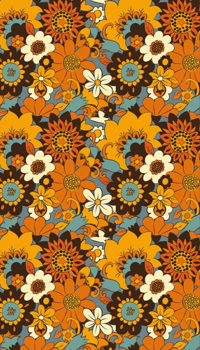 an orange and blue flower pattern on a black background with white, brown, yellow and green flowers