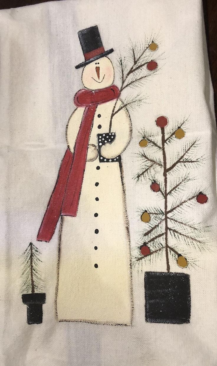 a white towel with a snowman on it