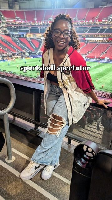 KaM Schoer on Instagram: "One thing about me? Oh, I always understand the (dress code) assignment 😌

Get into this 90s-esque outfit, y'all! As soon as our sweet friends invited us to the @atlutd2 match this week, this outfit popped right in my head and it came together so cute! I usually wear a 14 in @americaneagle jeans but I'm wore an 18 curvy to the game so they'd actually be baggy 🙌🏾

Random KaM fact... I lived in Germany when they won the 2014 world cup so I kinda sorta am really into watching soccer!?! I honestly forgot how much I like until we go to the stadium 😅

#midsizeblogger #midsizestyle #size14 #sportyspice #atlantablogger" Watching Soccer, Thing About Me, 2014 World Cup, Midsize Style, In My Head, Dress Code, Mom Style, Dress Codes, About Me