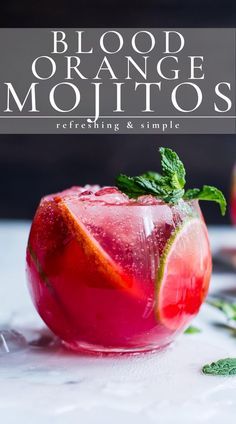 blood orange mojitos with fresh mint garnish on the rim and text overlay reading blood orange mojitos refreshing & simple