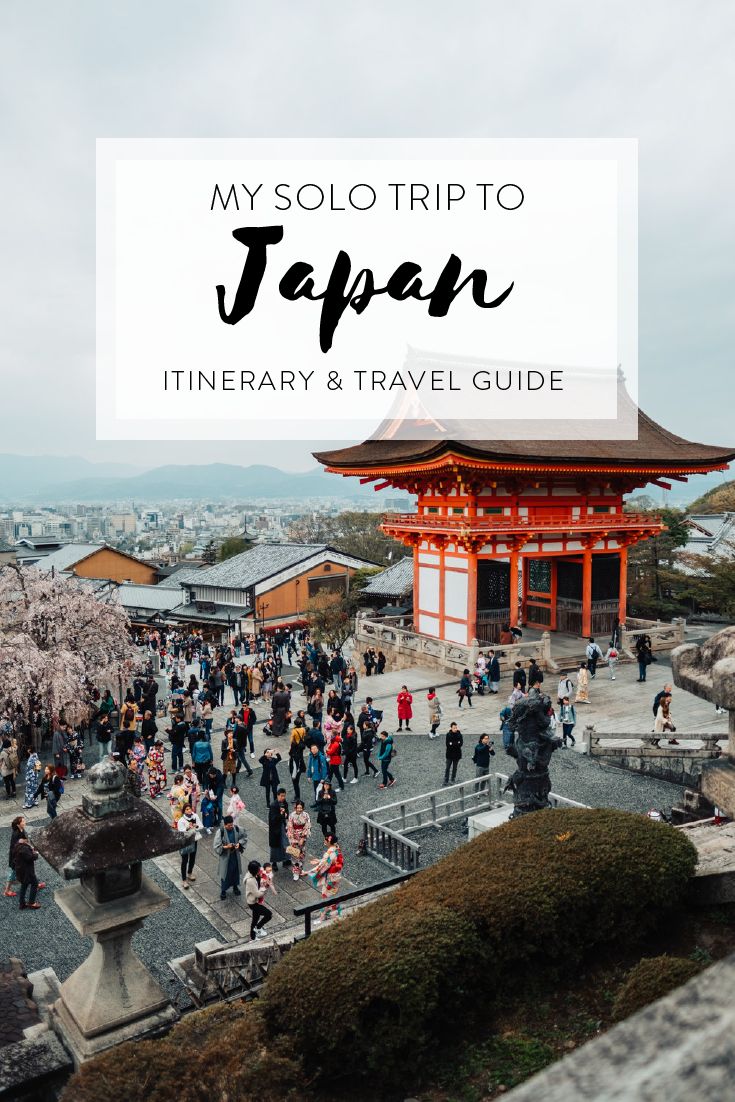 people walking in front of a pagoda with text overlay that reads my solo trip to japan itinerary & travel guide