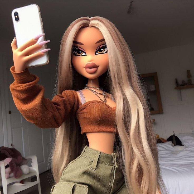 a doll holding up a cell phone to take a selfie