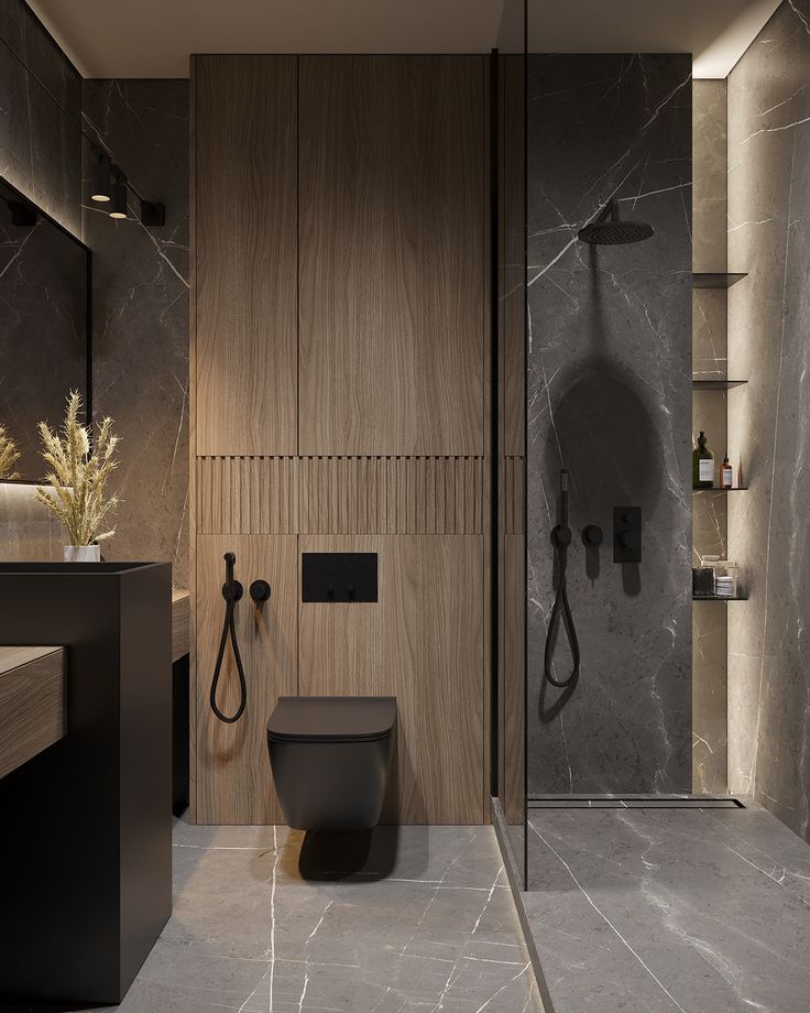 a modern bathroom with marble walls and flooring, including a shower stall in the middle