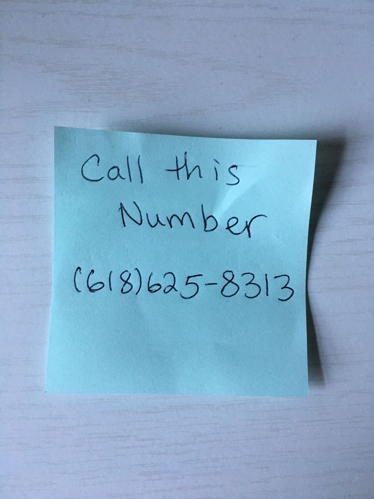 a piece of paper with the words call this number on it