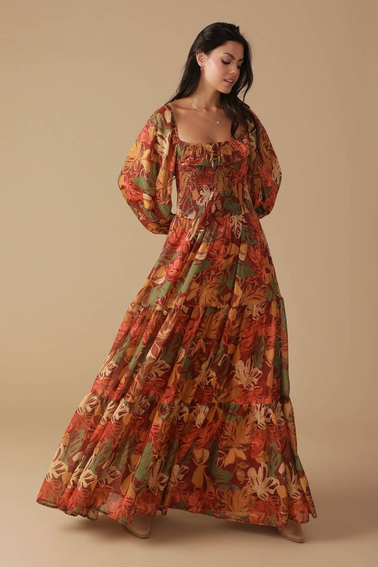 A printed woven maxi dress featuring square neckline with single layer ruffle and tie, smocked bodice, long sleeve and tiered skirt Details: Self : 100% PolyesterLining : 100% Polyester Size & Fit - Model is 5`8" And Wearing Size Small- Measurements Taken From Size Small- Approx. Length: 61" Bohemian Maxi Dress With Square Neck For Brunch, Bohemian Square Neck Maxi Dress For Brunch, Fall Square Neck Dress With Smocked Back, Fall Floral Print Maxi Dress With Square Neck, Fall Bohemian Maxi Dress With Square Neck, Bohemian Maxi Dress With Square Neck For Fall, Casual Tiered Maxi Dress For Fall, Bohemian Square Neck Maxi Dress For Fall, Fall Tiered Dress With Smocked Back