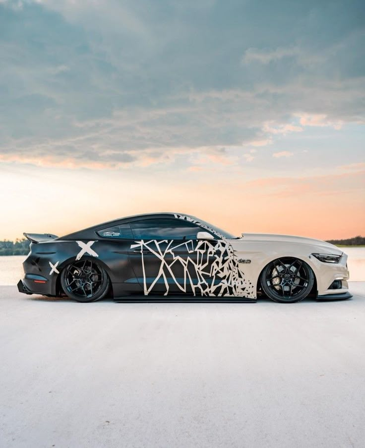 a car that has been painted with graffiti