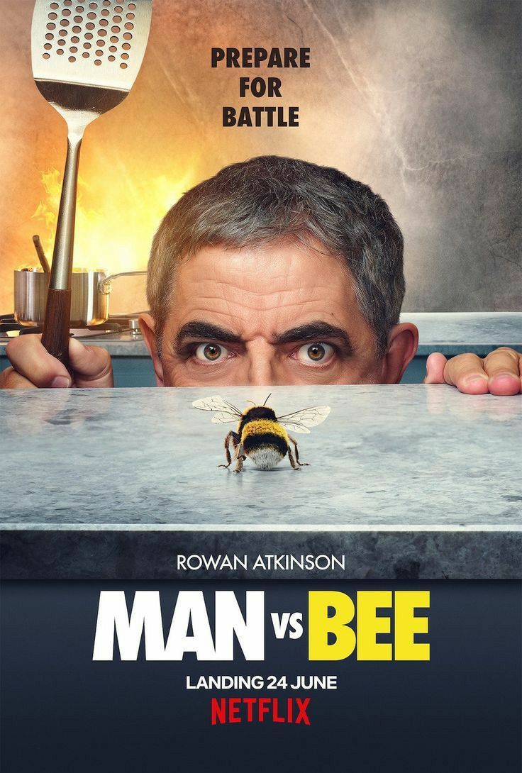 a movie poster for man vs bee with the face of a man peeking over a table