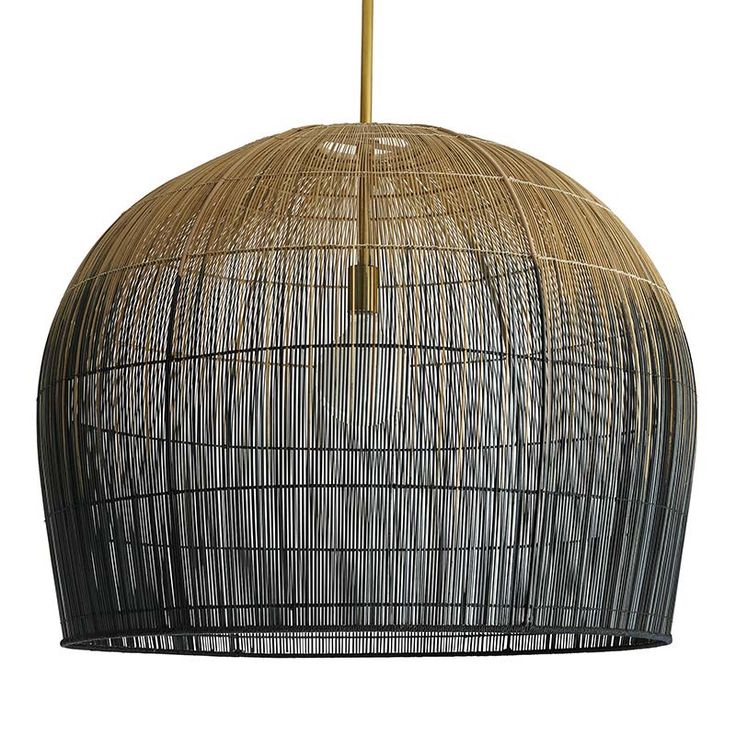 a large bamboo lamp hanging from a ceiling fixture with a gold metal bar on top