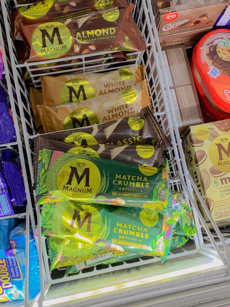 a grocery cart filled with lots of different types of snacks