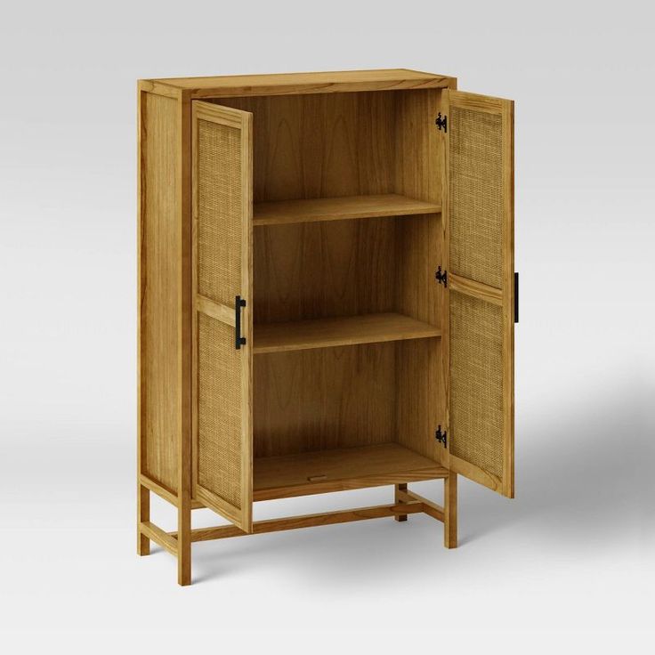 a wooden cabinet with two doors and shelves