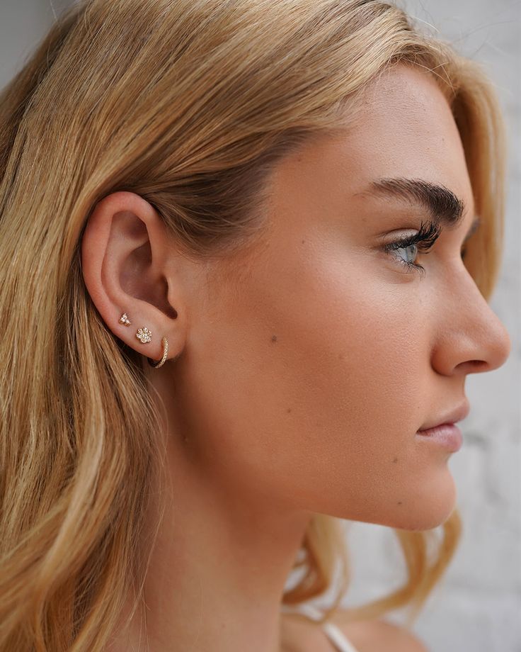 Diamond tiny paw stud earring. Sold as a single that is great for mixing and matching or purchase two for a dainty pair. Available in 14k yellow, white and rose gold. Sold as a Single or Pair Diamond Carat Weight: .09 ctw Total Weight: Approx. 0.35g (Single) Paw Pendant Size: Approx. 6mm (w) x 6mm (h) Standard Production: 7-10 business days Rush Order Production: 5-8 business days Shipping: Select shipping method at checkout. Shipped from our L.A. Studio. This item is Final Sale. See here for de Paw Pendant, Diamond Carat, Everyday Earrings, Personalized Necklace, Stud Earring, Diamond Earrings Studs, Ring Bracelet, Yellow White, Ring Earrings