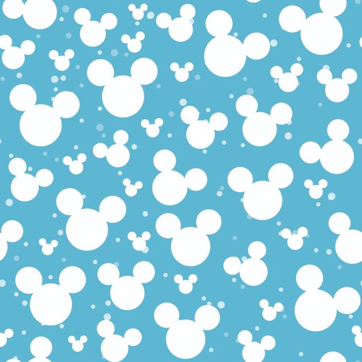 mickey mouse wallpaper in blue and white with polka dots on the bottom right corner