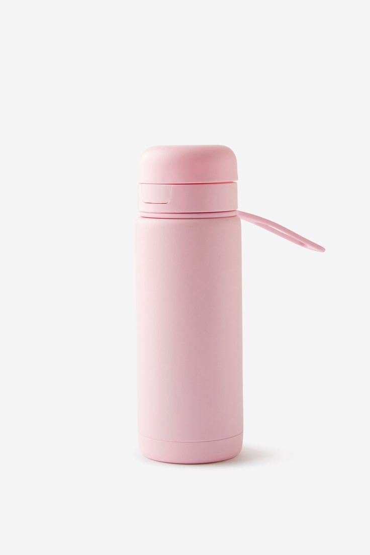 a pink thermos bottle on a white background