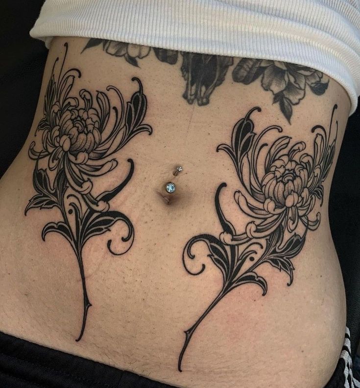 a woman's stomach with flowers on it