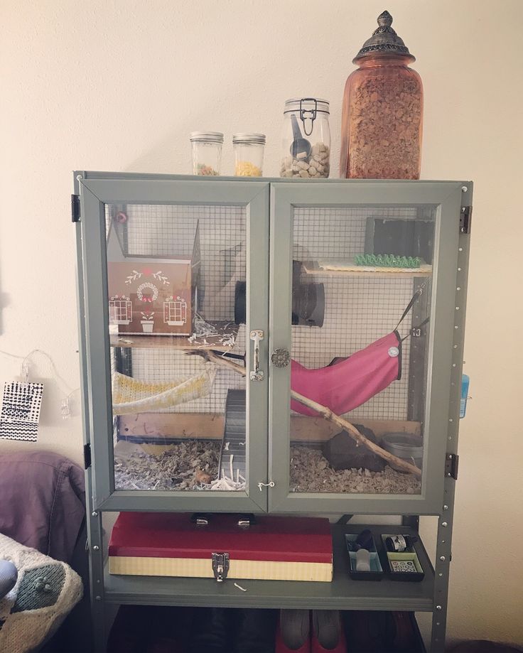 a large metal cabinet filled with lots of clutter