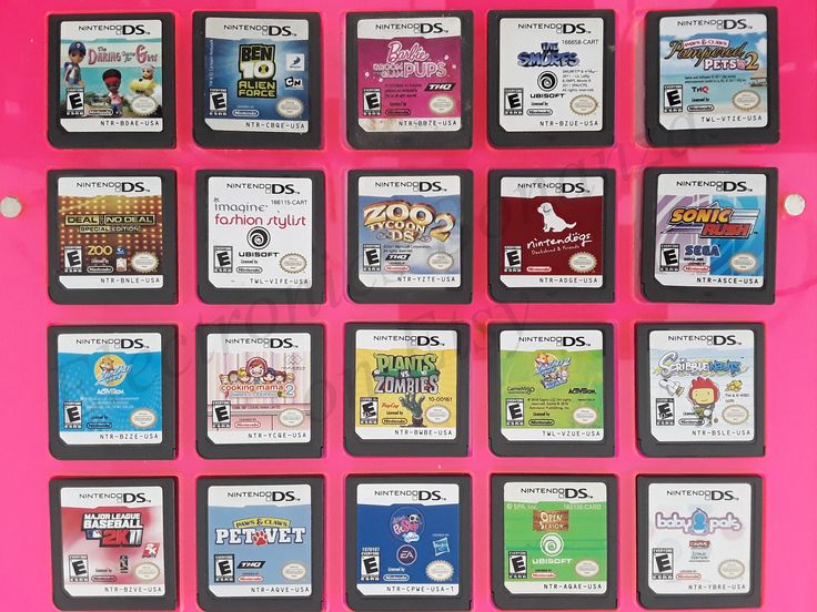 a pink display case with many different video games on the front and back sides,