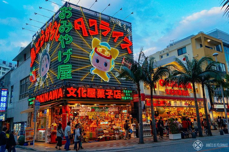 A neon lit gift store on the famous Kokusai Dori shopping street in Naha, Okinawa, Japan Okinawa Aesthetic, Yakuza Fanart, Japan Quotes, Japan Beach, Japan Okinawa, Miyakojima, American Village, Japan Holiday, Luck Symbol