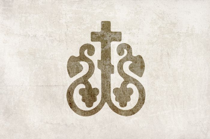 a cross and two snakes on a white background with the word jesus written below it