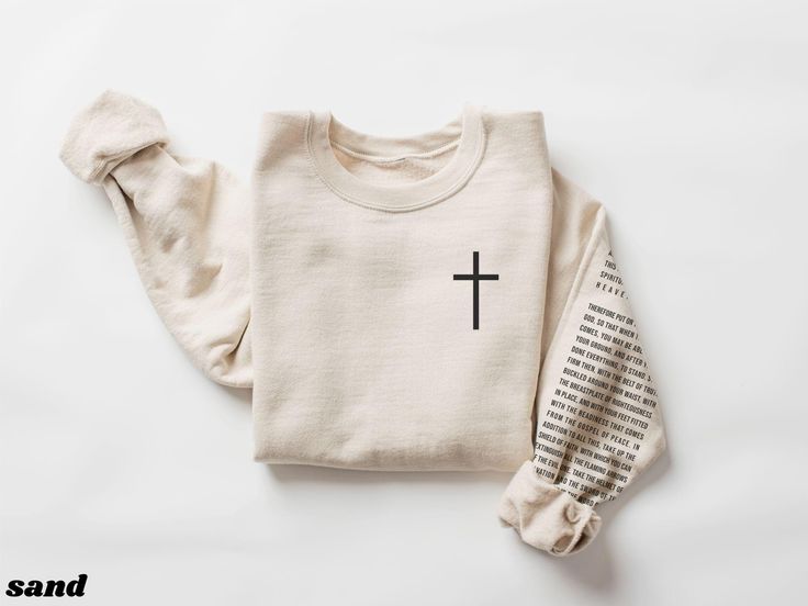 Wear your faith proudly with this cozy sweatshirt. 🤍Ephesians 6:10-18 This crewneck sweatshirt is pure comfort. Made from a soft cotton/poly blend with no itchy side seams, it is sure to become a staple. Please note: Colors may appear slightly different in-person due to computer/phone screens. SIZE AND FIT: Your sweatshirt design will be printed on a high-quality, soft and comfortable unisex sweatshirt. Sizes run true to size, which takes the guesswork out of ordering; if you like your sweatshi Inspirational Long Sleeve Relaxed Fit Top, Inspirational Relaxed Fit Long Sleeve Top, Cute Christian Sweatshirts, Christian Sweatshirt Designs, Scripture Sweatshirts, Christian Crew Neck Sweatshirt, Made To Worship Sweatshirt, Christian Sweater, Pray Sweatshirt