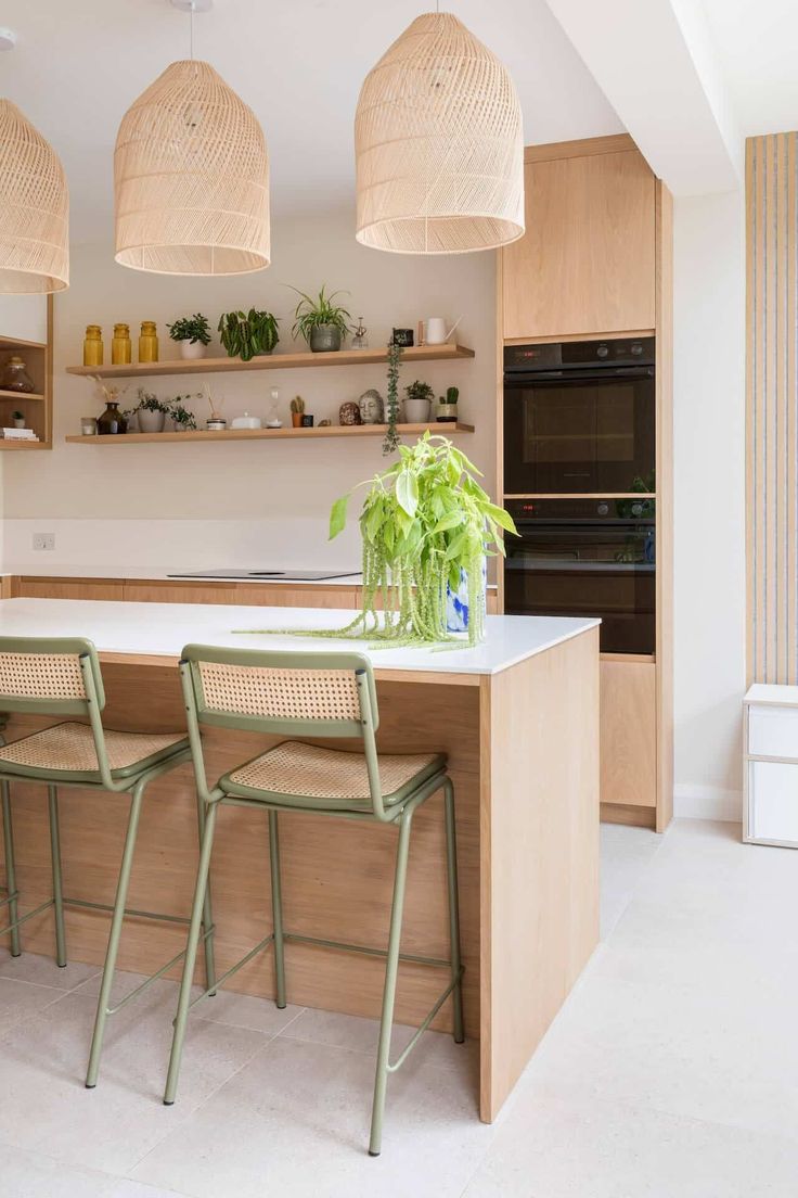 the kitchen is clean and ready to be used as a dining room or bar area