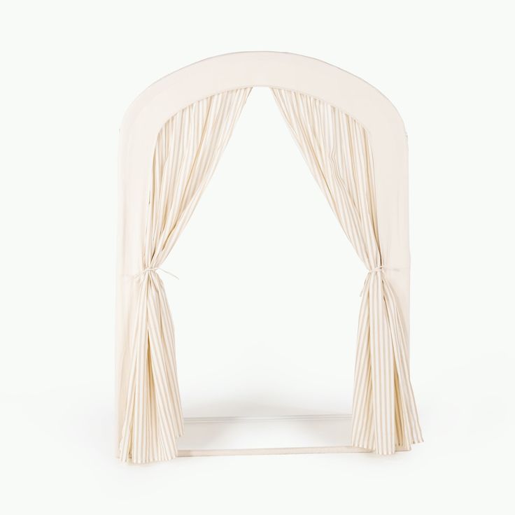 an arch made out of white fabric with curtains on the top and bottom side, in front of a white background